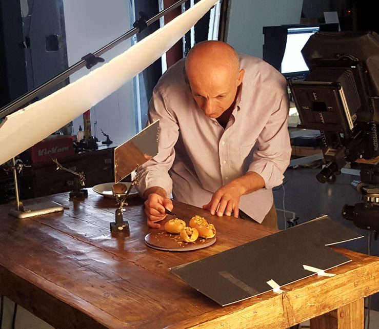 London food photographer Michael Michaels, making final adjustments before shooting