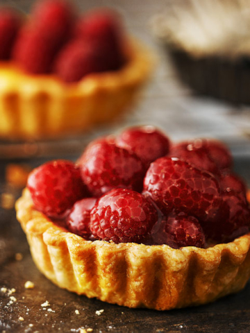 Raspberry tart dessert by London food photographer Michael Michaels