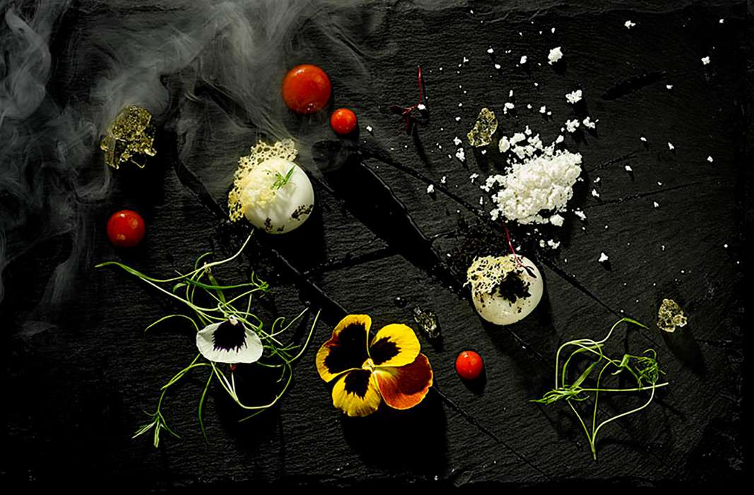 Sweet canape selection on black slate. Photography by Food Photographer London, Michael Michaels