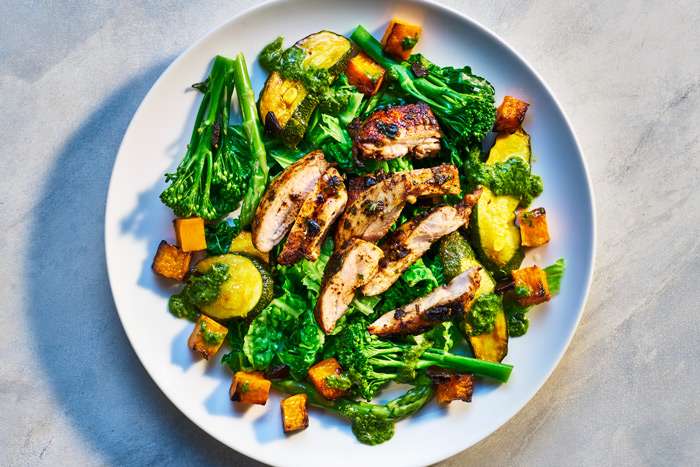 Photo of Gilled chicken with broccoli, sweet potato cubes and vegetables by London food photographer Michael Michaels