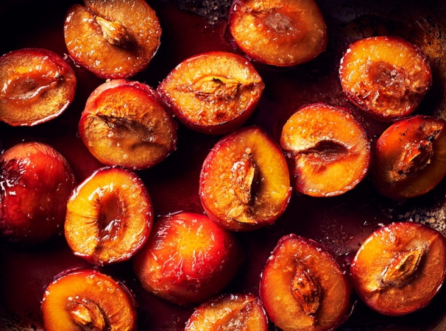 Baked Plums in tray by London food photographer Michael Michaels